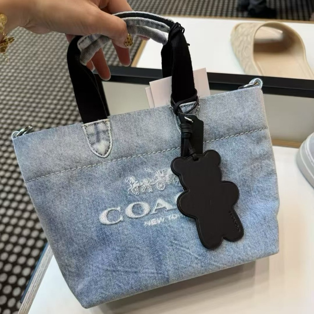 NWT Coach Mini Tour Tote Bag
In Loved Denim